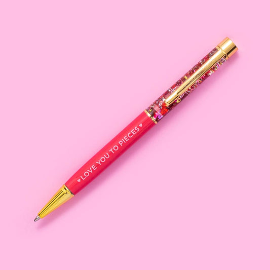 pink pen with gold trim and confetti – perfect for gifts and stationery lovers.