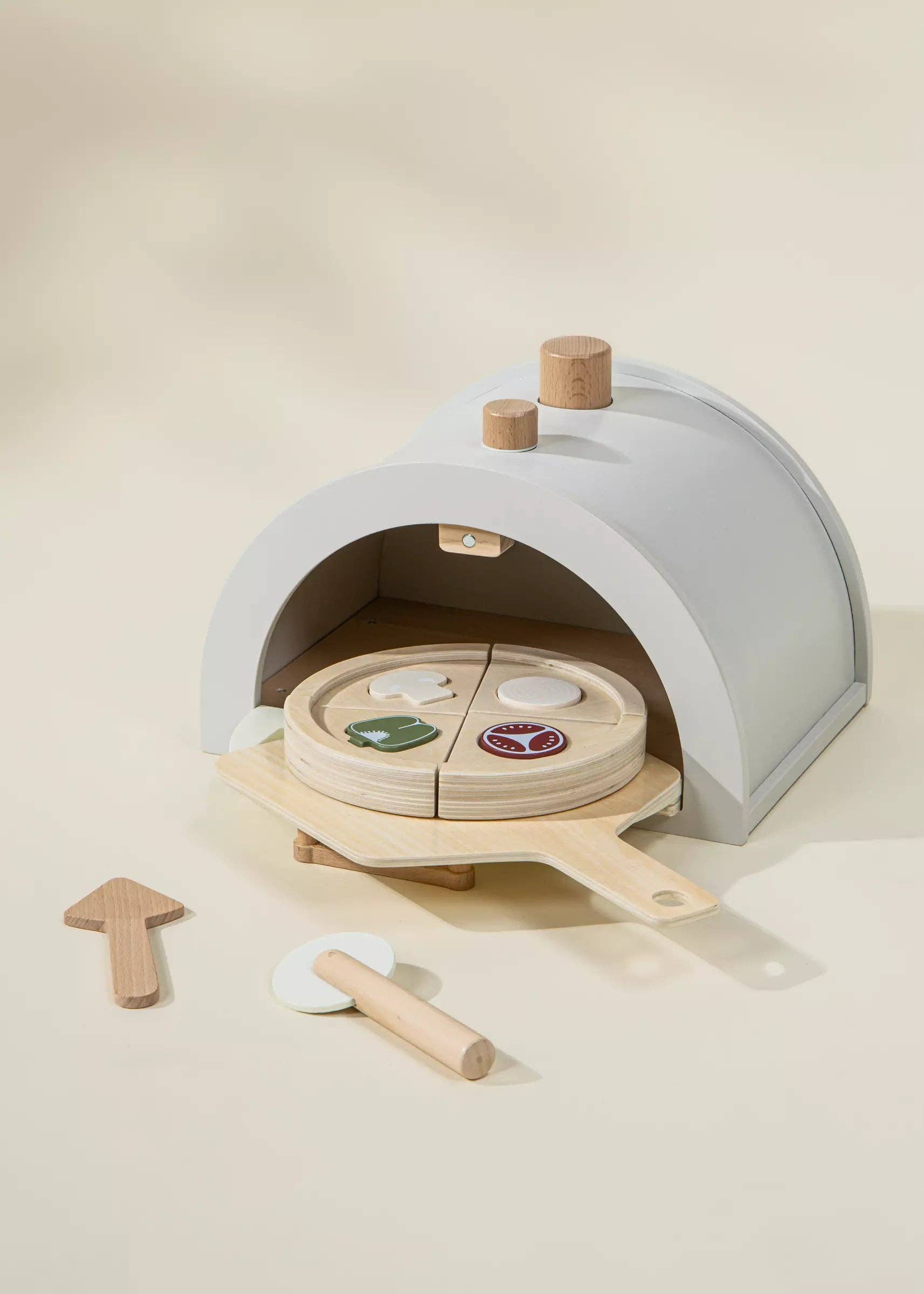 Wooden Pizza Oven Playset for kids with oven, 4 pizza slices, tomato, onion, mushroom, green pepper, pizza peel, cutter, and pie server. Ideal for pretend play, sparking creativity, and hosting pizza parties where little chefs can bake and share their creations.