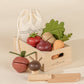 Wooden market basket playset with 7 sliceable veggies & knife for pretend play fun. Great for kids!