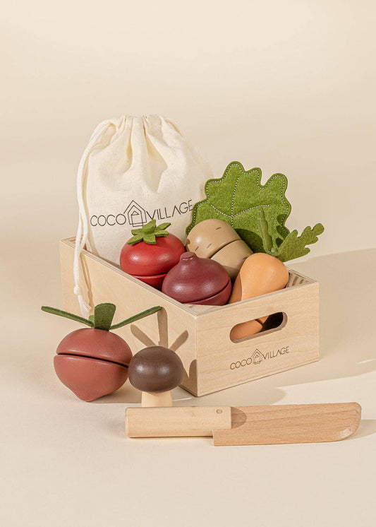 Wooden Market Basket Playset with 7 sliceable veggies: tomato, radish, carrot, potato, lettuce leaf, mushroom, and beet, plus a wooden knife. Perfect for imaginative play, encouraging healthy eating habits and developing motor skills in kids. Pairs with mini-market or kitchen sets.