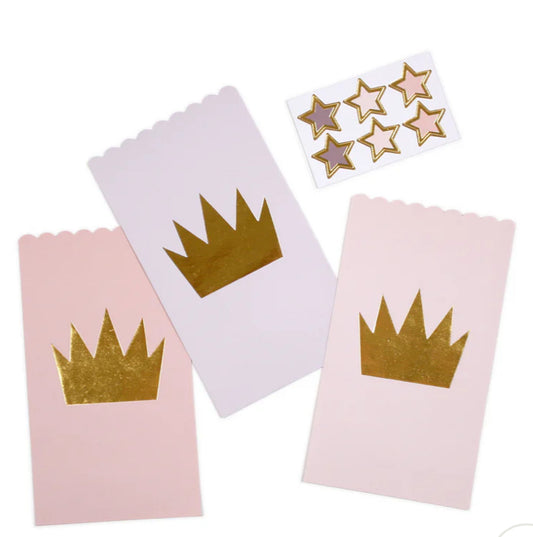 Princess-themed paper treat bags in blush, pale pink, and lavender, each featuring a gold-foiled crown. Includes 24 bags with 24 gold-accented star sticker seals. Perfect for princess parties, ladies night out, or bunco party favors. Excitement guaranteed!"