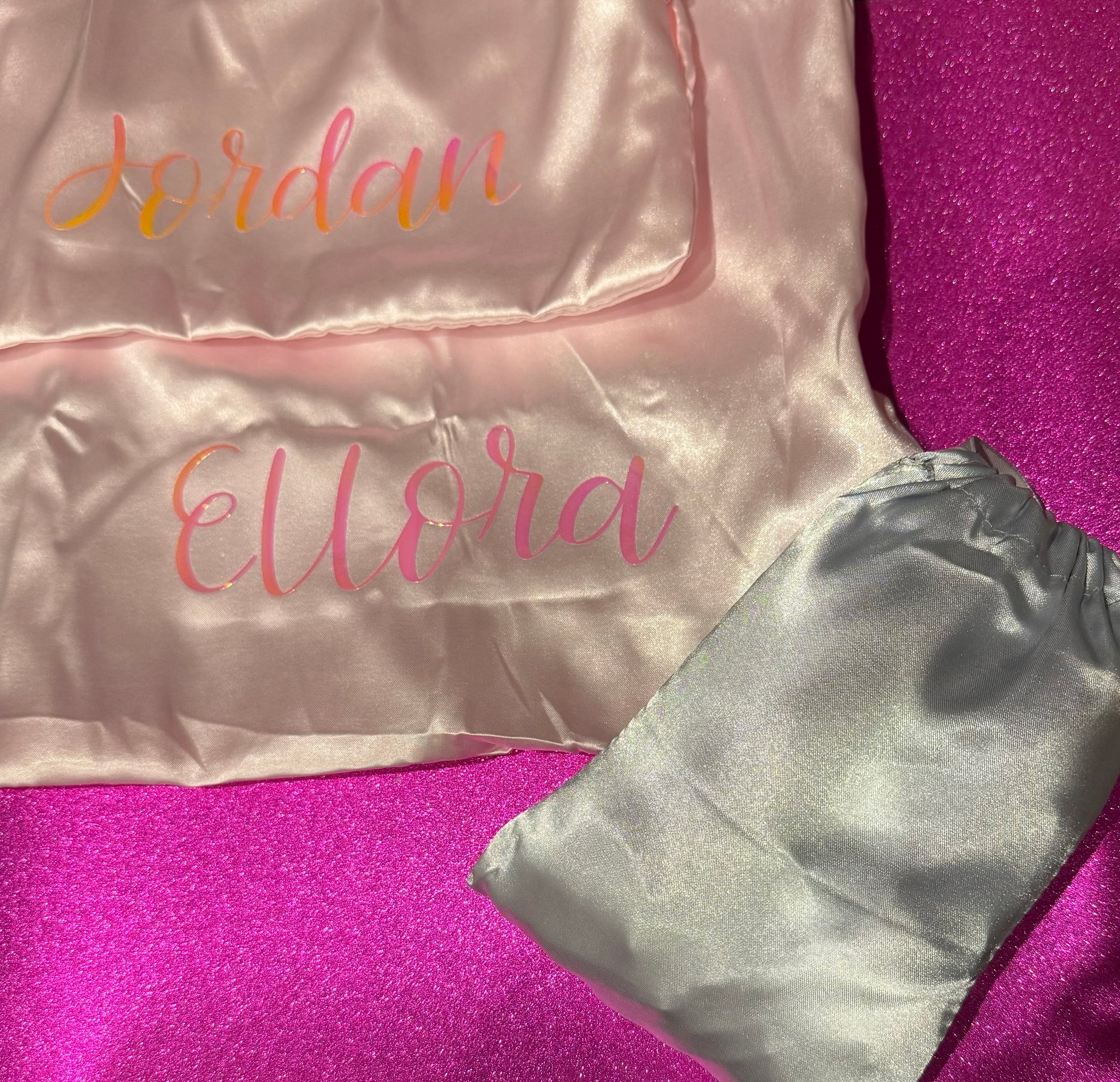 Personalized satin pillowcase made from soft microfiber fabric, perfect for reducing facial creases and wrinkles. Comes in a satin pouch for easy storage.