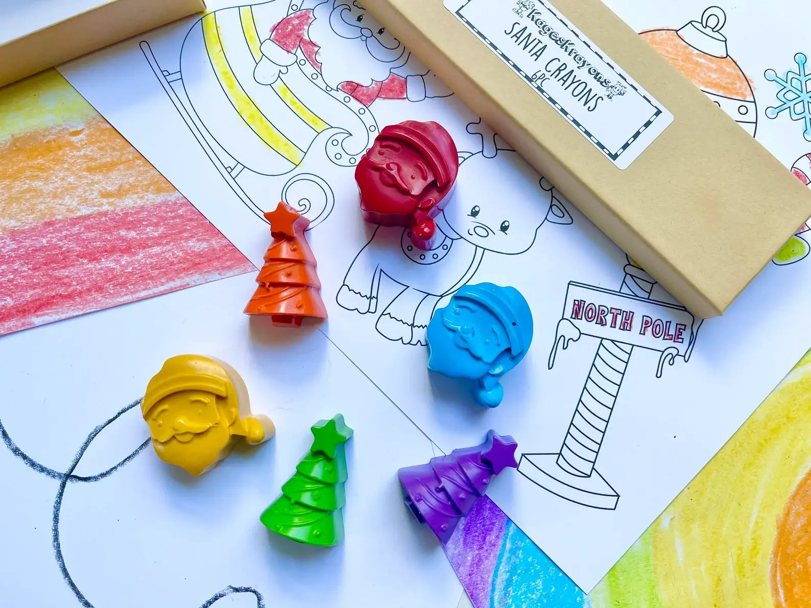 Santa Crayon Gift Set featuring 100% non-toxic holiday-themed crayons in festive shapes for stocking stuffers and party favors, packaged in a gift box.