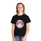 Kids’ summer t-shirt with a leopard print smiley face and watermelon sunglasses. Soft, durable cotton, available in youth sizes XS-XL. Perfect for summer activities.