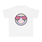 Kids’ summer t-shirt with a leopard print smiley face and watermelon sunglasses. Soft, durable cotton, available in youth sizes XS-XL. Perfect for summer activities.