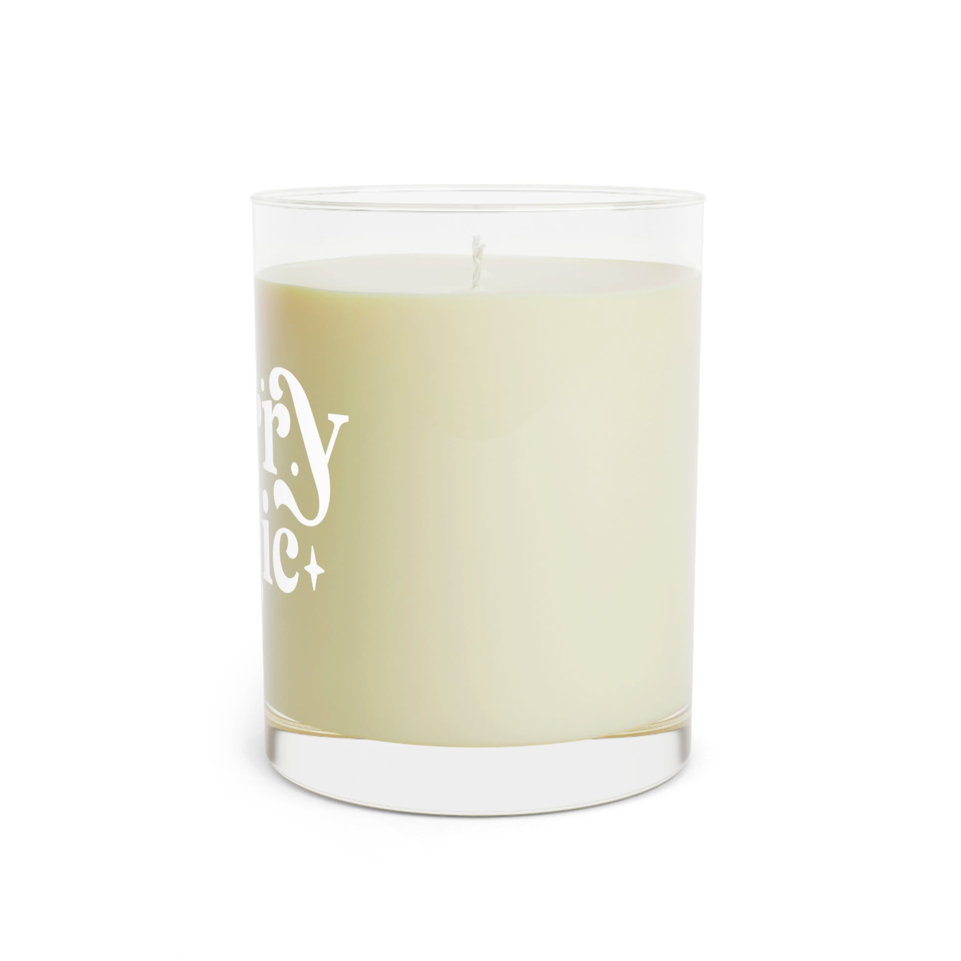 Merry Magic Holiday Candle made of eco-friendly soy wax with white tea and fig scent, featuring two cotton-cored wicks and a sturdy cardboard lid. Perfect for holiday gatherings and home decor. Long-lasting 65-hour burn time, ideal as a unique gift idea for candle lovers and self-care enthusiasts.