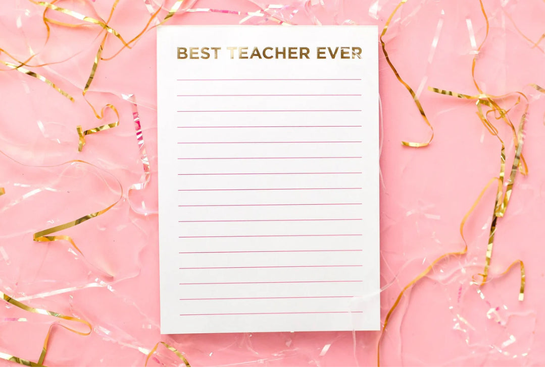 5x7 "Best Teacher Ever" notepad with 50 lined sheets and shiny gold foil on each page. Features a magnet on the back, perfect for teacher appreciation gifts. Comes in shrink-wrap packaging.