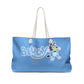 Blue tote bag featuring cartoon dogs discussing pool safety essentials, with text 'Boring Pool Things (That Are Still Important!)', designed with a playful and educational theme.