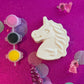 Unicorn-themed DIY paint kits, perfect party favors for kids' events. Each handmade party favor bag includes a mini sculpture, paints, and a paintbrush, encouraging artistic expression in kids aged 3+. Great for birthdays, baby showers, sleepovers, and family reunions. Ideal indoor activity for toddlers and preschoolers, packaged in cute, whimsical designs.