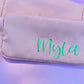 Personalized cosmetic pouch with zipper, featuring custom name, initials, or trendy icons. Lightweight and durable, available in neon or neutral colors with gold zippers. Size: 10" long x 5" wide x 3" deep. Perfect for summer slumber parties, travel, school, or as a makeup organizer. Great gift for girls, bridesmaids, or team members.