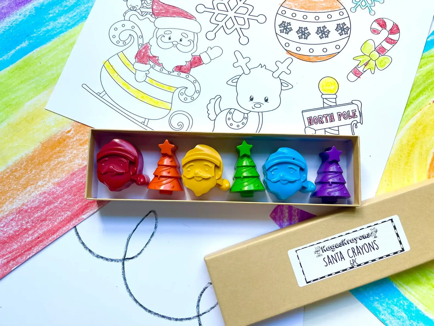 Santa Crayon Gift Set featuring 100% non-toxic holiday-themed crayons in festive shapes for stocking stuffers and party favors, packaged in a gift box.