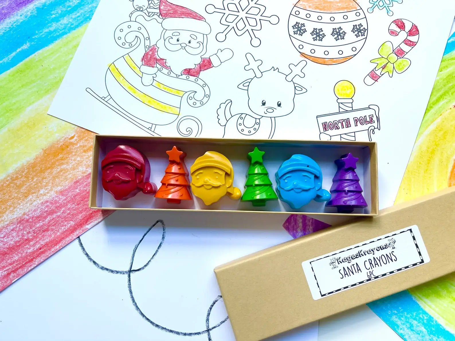 Santa Crayon Gift Set featuring 100% non-toxic holiday-themed crayons in festive shapes for stocking stuffers and party favors, packaged in a gift box.