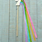 Unicorn Wand from Sparkle Sisters by Couture Clips featuring a glittering unicorn with grosgrain ribbon hair. This enchanting toy wand inspires imaginative play, making it perfect for dress-up and creative adventures for kids. The sparkling design and charming details encourage storytelling and fun, making it an ideal gift for young dreamers.