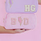 Personalized cosmetic pouch with zipper, featuring custom name, initials, or trendy icons. Lightweight and durable, available in neon or neutral colors with gold zippers. Size: 10" long x 5" wide x 3" deep. Perfect for summer slumber parties, travel, school, or as a makeup organizer. Great gift for girls, bridesmaids, or team members.