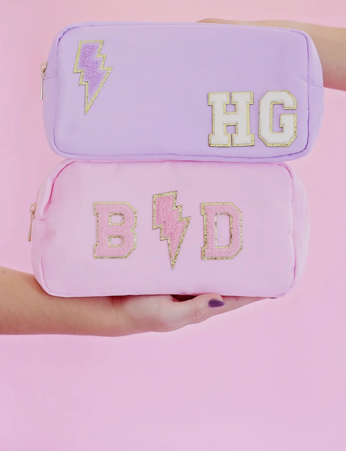 Personalized cosmetic pouch with zipper, featuring custom name, initials, or trendy icons. Lightweight and durable, available in neon or neutral colors with gold zippers. Size: 10" long x 5" wide x 3" deep. Perfect for summer slumber parties, travel, school, or as a makeup organizer. Great gift for girls, bridesmaids, or team members.