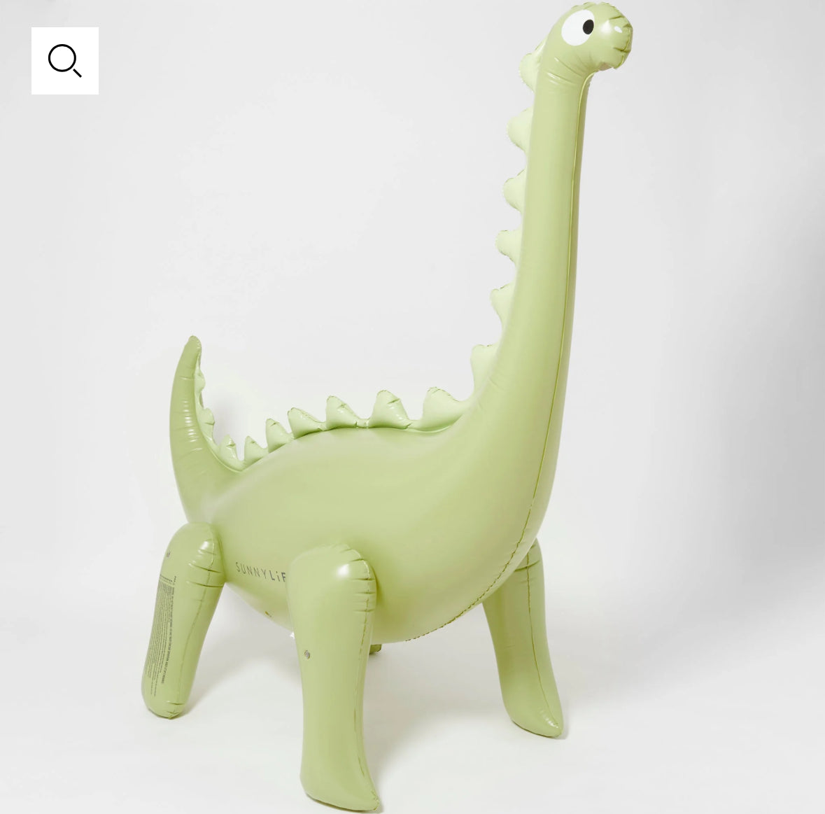 Into The Wild Dino Giant Sprinkler, standing over 6 feet tall. Attach to your garden hose for refreshing water play. Made from durable, non-toxic PVC. Perfect for kids' summer fun with lifelike 3D details. Includes hose adaptor and repair patch.