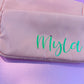 Personalized cosmetic pouch with zipper, featuring custom name, initials, or trendy icons. Lightweight and durable, available in neon or neutral colors with gold zippers. Size: 10" long x 5" wide x 3" deep. Perfect for summer slumber parties, travel, school, or as a makeup organizer. Great gift for girls, bridesmaids, or team members.