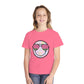 Kids’ summer t-shirt with a leopard print smiley face and watermelon sunglasses. Soft, durable cotton, available in youth sizes XS-XL. Perfect for summer activities.