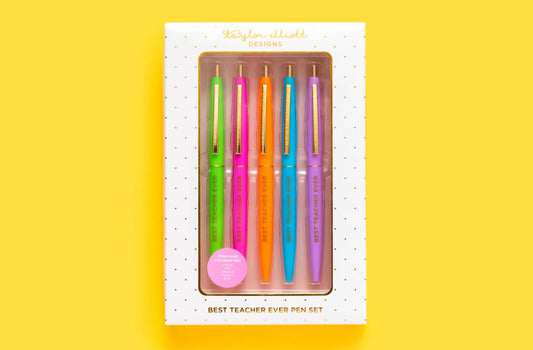 Set of 5 colorful "Best Teacher Ever" pens with matching ink colors. Medium ballpoint pens in a white gift box with gold foil dots, perfect for teacher appreciation gifts.