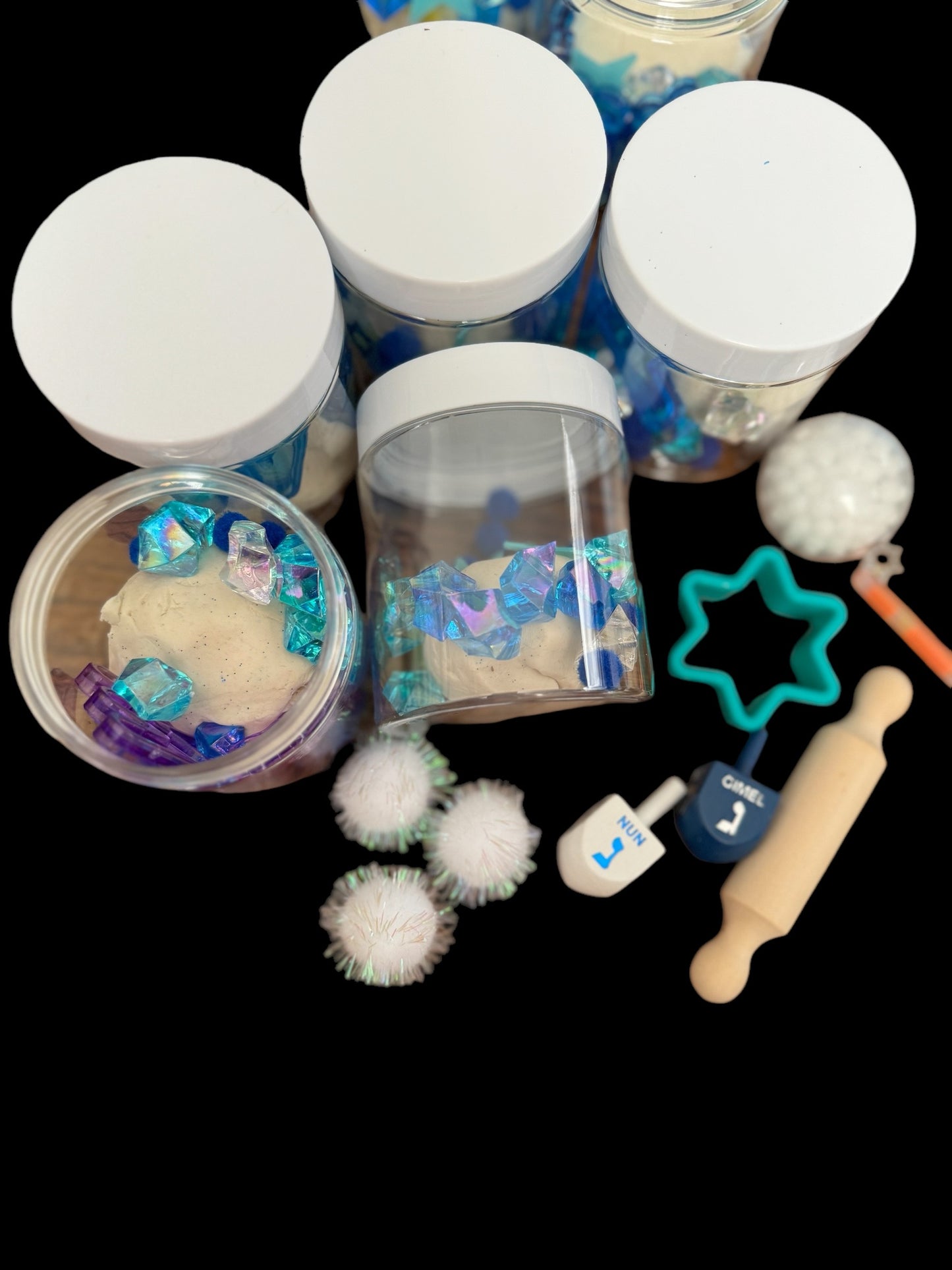 Hanukkah Play Dough Sensory Kit featuring festive activities designed for children, promoting sensory exploration and creativity, perfect for holiday gifting and classroom fun.