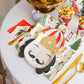 Nutcracker shaped party plates featuring gold foil accents, measuring 7.75" x 10", perfect for serving snacks or desserts at holiday celebrations. Includes 8 plates per set.