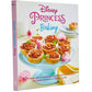 Disney Princess cookbook gift set featuring 60+ recipes inspired by iconic princesses like Tiana, Ariel, and more. Includes exclusive Disney Princess rubber spatula, measuring spoons, full-color photography, and tips for magical baking moments with family.