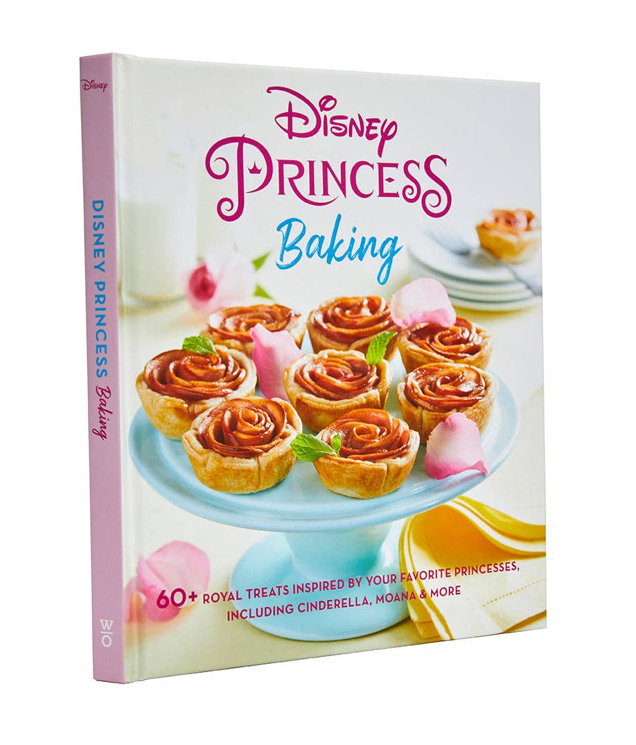 Disney Princess cookbook gift set featuring 60+ recipes inspired by iconic princesses like Tiana, Ariel, and more. Includes exclusive Disney Princess rubber spatula, measuring spoons, full-color photography, and tips for magical baking moments with family.