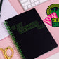 Wicked-inspired mini notebook with 160 college-ruled pages, durable hardcover, and convenient pockets.