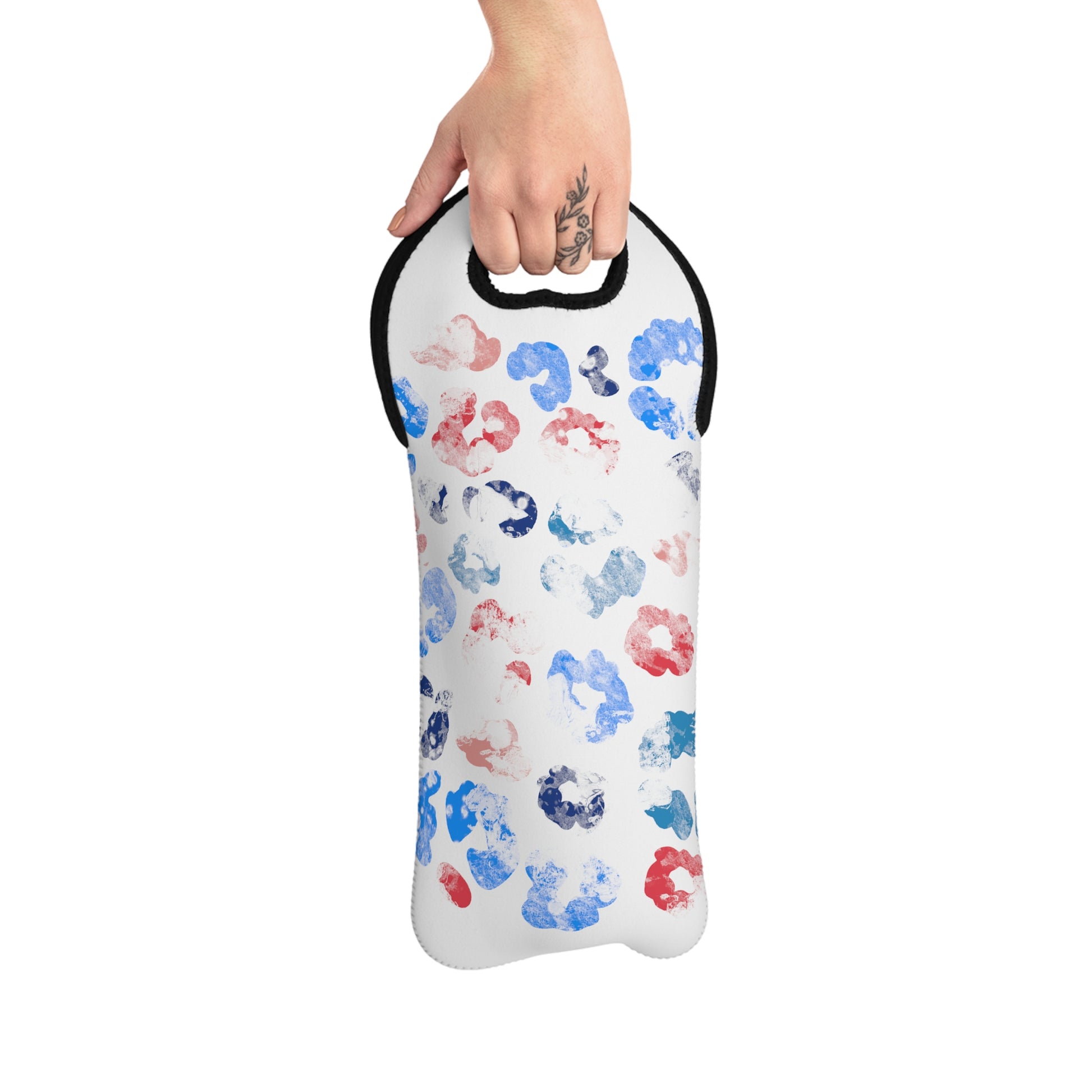 Red, white, and blue leopard print wine bag, perfect for parties and outdoor events. Insulated neoprene cooler bag designed to carry standard 750ml wine bottles."