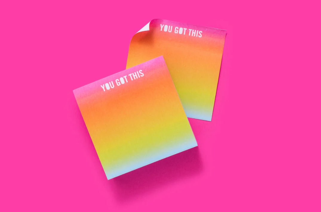 Colorful sticky notes measuring 3.5" x 3.5", featuring the inspirational phrase 'You Got This.' Each pad includes 300 sheets with a sticky adhesive backing, shrink-wrapped for packaging. Perfect for adding fun to your workday. 