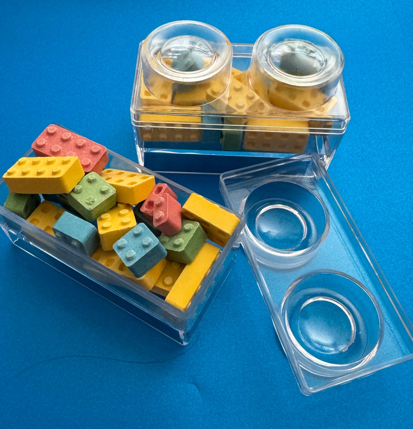 Block-themed candy favor in a brick-shaped box, perfect for birthday parties or playdates. Includes Lego-themed candies with optional cellophane wrap and thank you label. Custom candy containers available upon request.