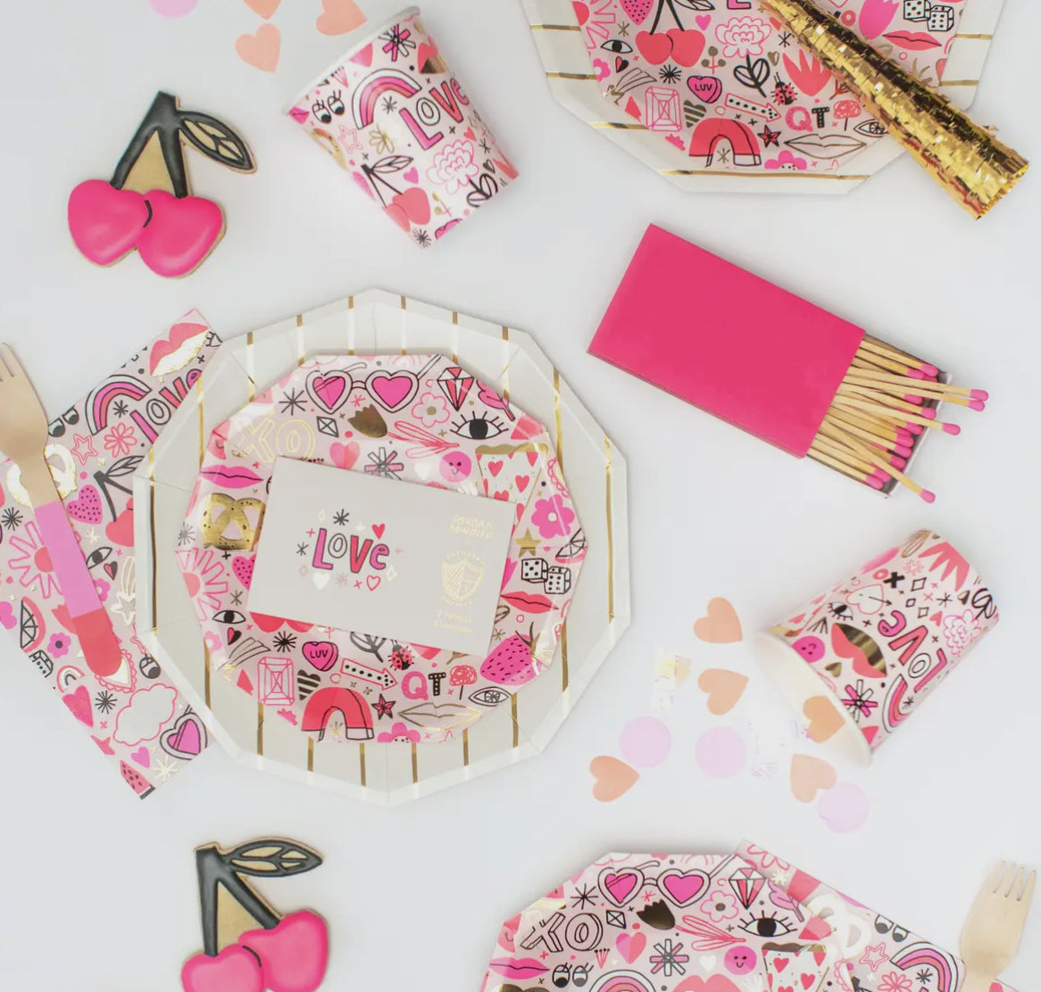 Valentine's Day paper napkins featuring neon colors and gold foil accents, illustrated by Jordan Sondler for Daydream Society. Package includes 16 napkins, each measuring 6.5 inches folded. Perfect for adding a festive touch to your Valentine's party table.