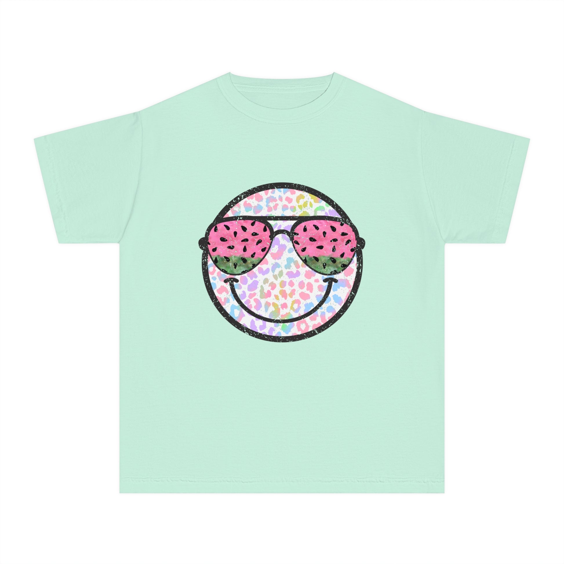 Kids’ summer t-shirt with a leopard print smiley face and watermelon sunglasses. Soft, durable cotton, available in youth sizes XS-XL. Perfect for summer activities.