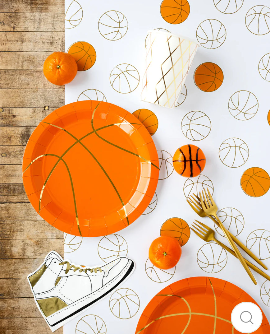 Basketball-shaped napkins, perfect for kids' parties, adding a fun touch to your event. Each package includes 24 paper napkins, measuring 5" x 5