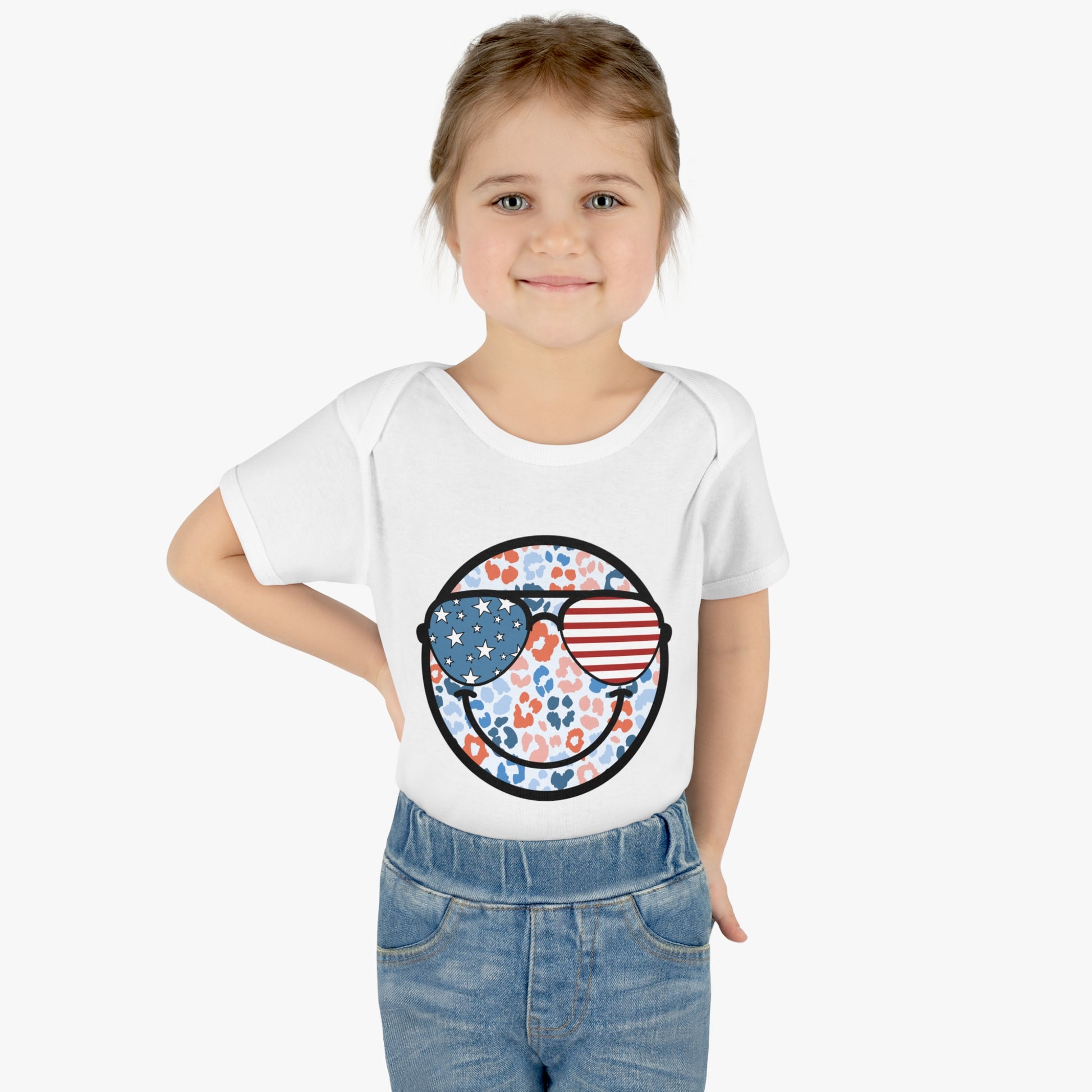 Retro Smiley Face Sunglasses Onesie featuring Patriotic 'Let Freedom Ring' design for Fourth of July celebrations. Vintage style comfort colors t-shirt with smiling happy face and USA flag sunglasses.