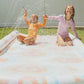 Colorful Tie Dye Slip, Slide, and Body Board Set designed for water fun in the sun, featuring easy hose connections and a repair patch for durability.