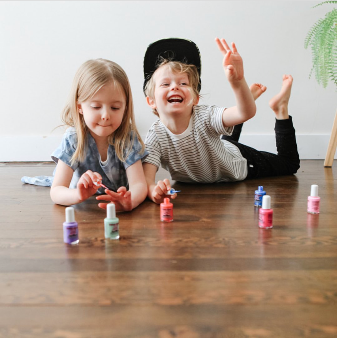 Mini scented Wacky Watermelon nail polish by Piggy Paint, featuring a non-toxic, water-based formula that is cruelty-free, vegan, and kid-friendly. Safe for pregnancy, this polish offers vibrant watermelon color and a sweet scent.