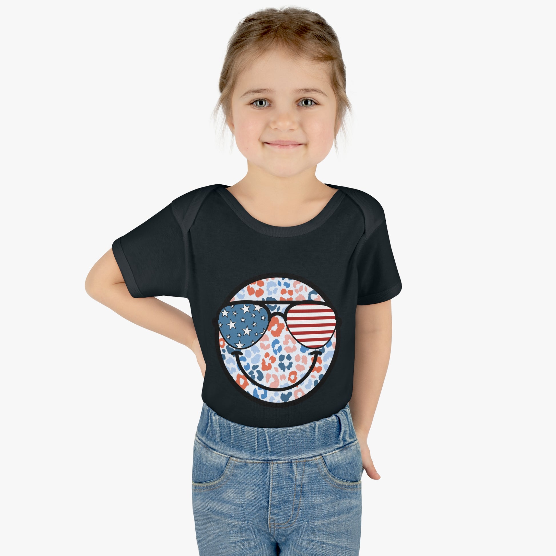 Retro Smiley Face Sunglasses Onesie featuring Patriotic 'Let Freedom Ring' design for Fourth of July celebrations. Vintage style comfort colors t-shirt with smiling happy face and USA flag sunglasses.