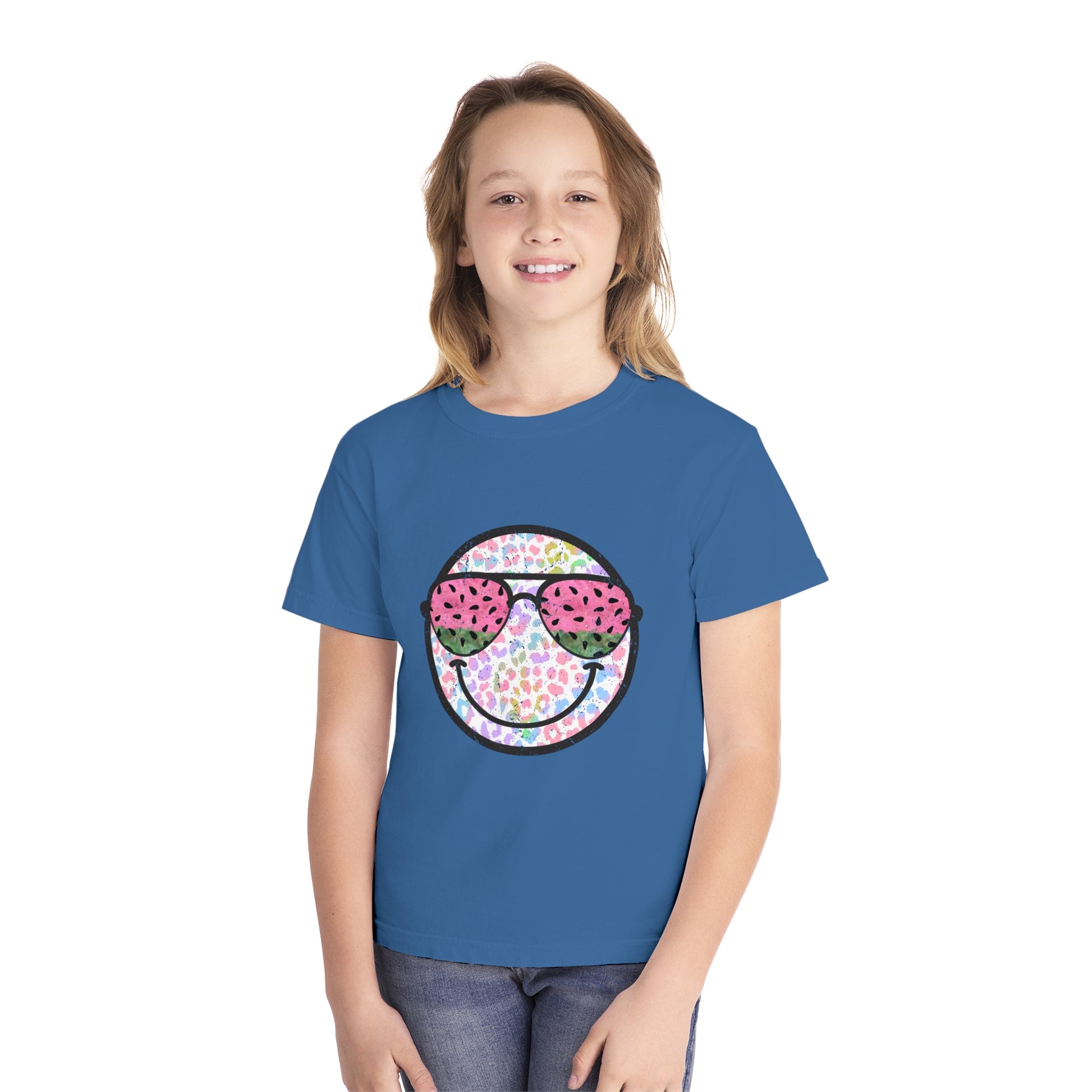 Kids’ summer t-shirt with a leopard print smiley face and watermelon sunglasses. Soft, durable cotton, available in youth sizes XS-XL. Perfect for summer activities.