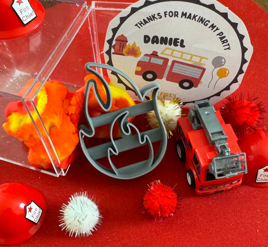 Exciting firefighter-themed sensory kit for kids aged 3 and up, including natural homemade play dough, dough molds, and miniature fire safety toys for imaginative play.