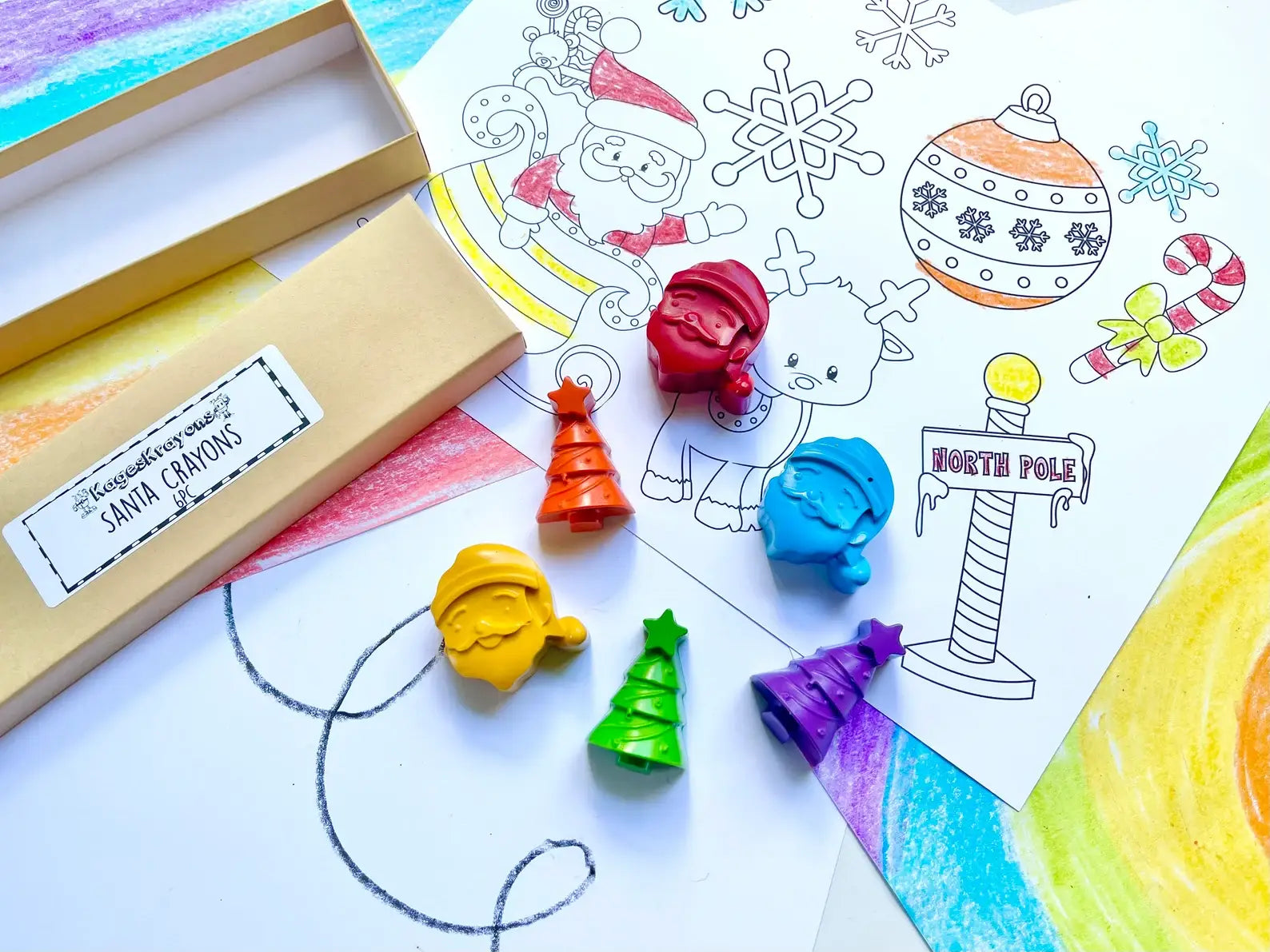 Santa Crayon Gift Set featuring 100% non-toxic holiday-themed crayons in festive shapes for stocking stuffers and party favors, packaged in a gift box.