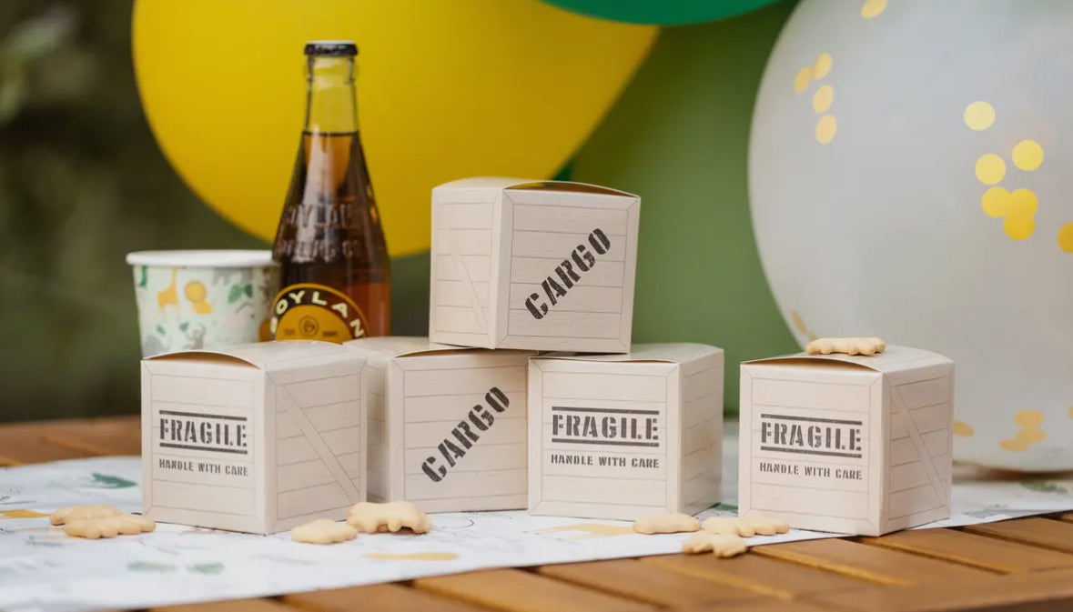 Safari-themed favor boxes designed to resemble cargo boxes, perfect for birthday party treats. Includes 8 closable boxes, each measuring 3 inches tall, wide, and deep. Add adventure to your celebrations with these fun and functional treat boxes.