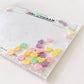 Confettigram: Send a sweet, love-filled telegram with hand-mixed confetti shaped like classic sweethearts candies. Fun, unique, and perfect for Valentine's Day!