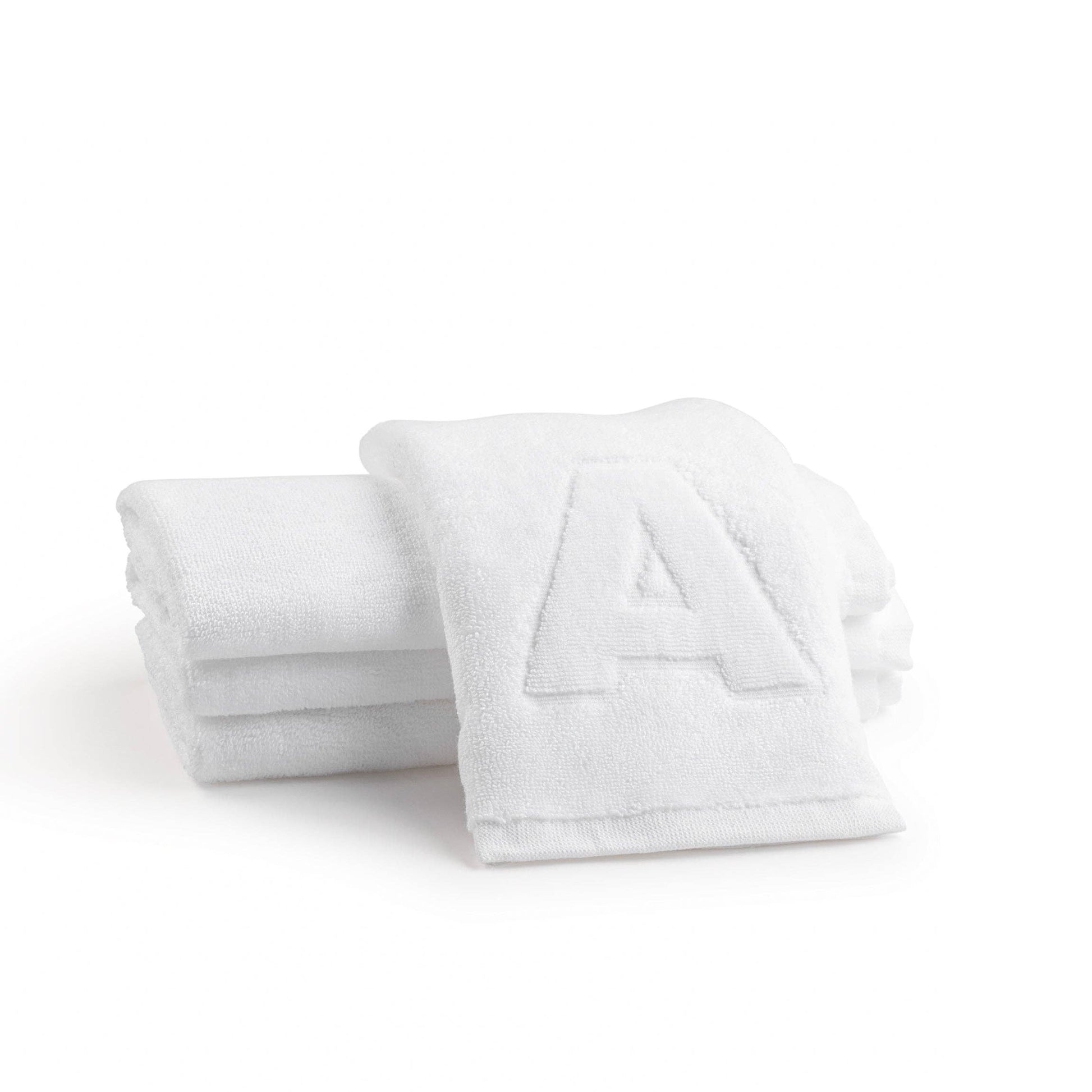 Elegant cotton finger towels with embossed initials, perfect for any room, gift-ready.