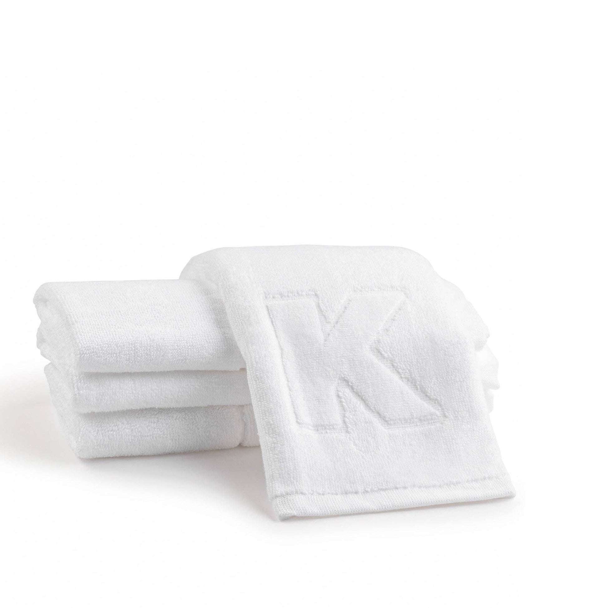 Elegant cotton finger towels with embossed initials, perfect for any room, gift-ready.