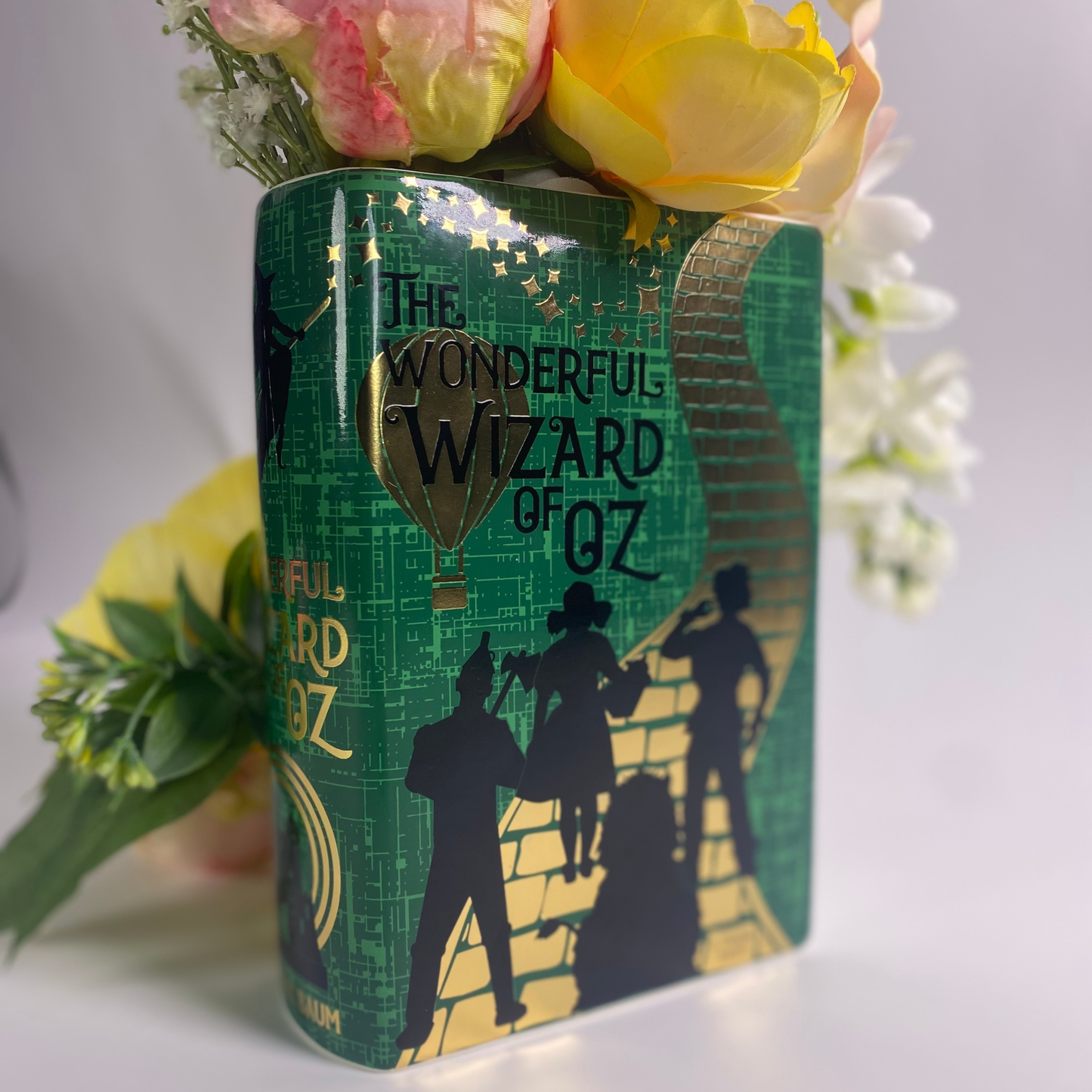 Steel Mill and Co's decorative book vase with literary-inspired artwork, ceramic design, perfect for flowers or kitchen utensils.