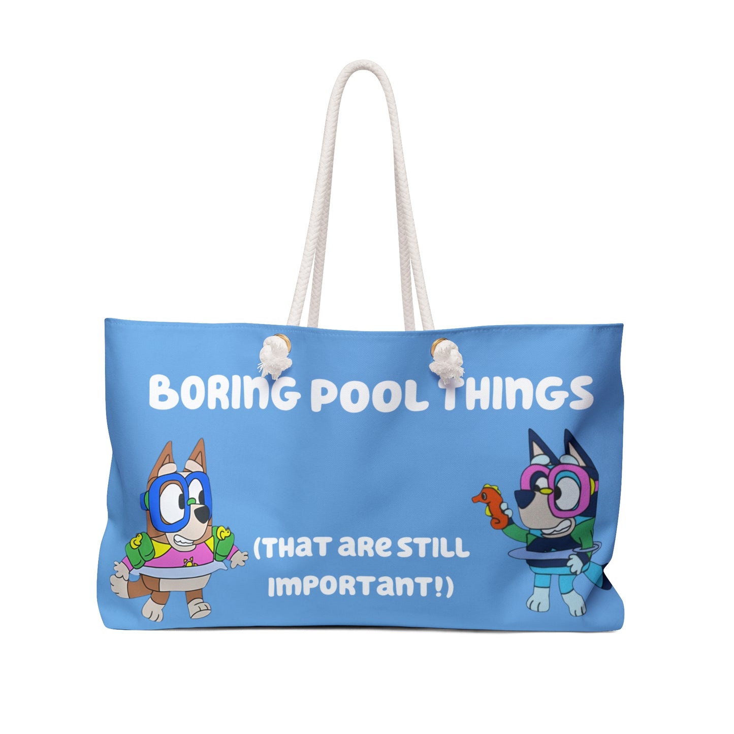 Blue tote bag featuring cartoon dogs discussing pool safety essentials, with text 'Boring Pool Things (That Are Still Important!)', designed with a playful and educational theme.