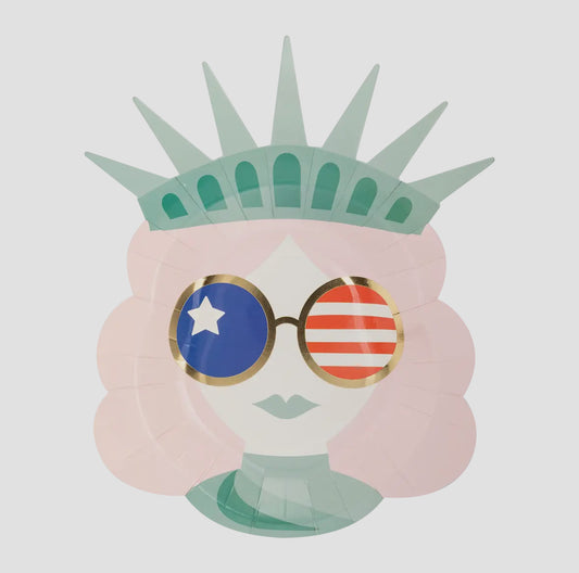 Lady Liberty Sunnies Shaped Paper Plates, perfect for patriotic parties. Includes 8 plates, each 8 x 10 inches. Add a fun and stylish touch to your table setting, letting you enjoy your food with a side of freedom. Ideal for any patriotic gathering.