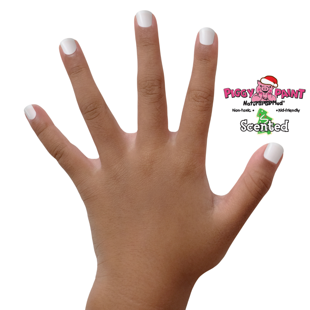 Limited edition Holiday Sugar Cookie nail polish by Piggy Paint, featuring a non-toxic, water-based formula that is cruelty-free, kid-friendly, and safe for pregnancy. Perfect for holiday-inspired manicures and festive candy cane nails.