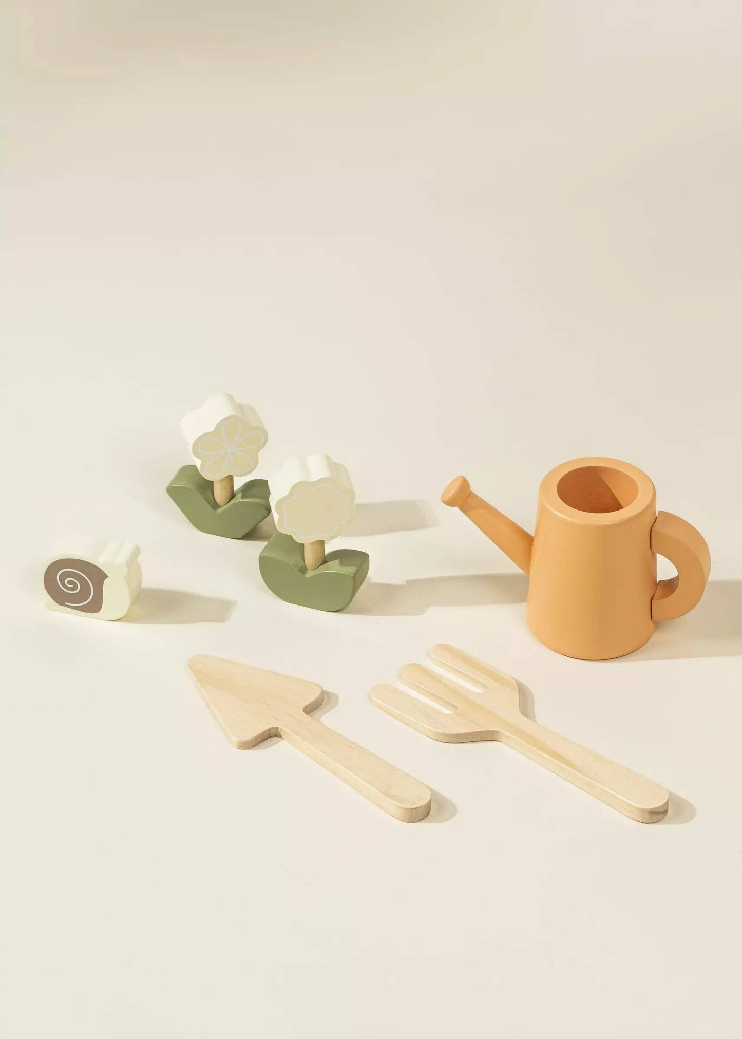 Wooden Garden Playset for kids with flowers, carrots, tomatoes, mushrooms, snail, gardening tools, watering can, and garden signs. Perfect for nature-inspired imaginative play, helping children learn about gardening while developing motor and social skills in a fun way.